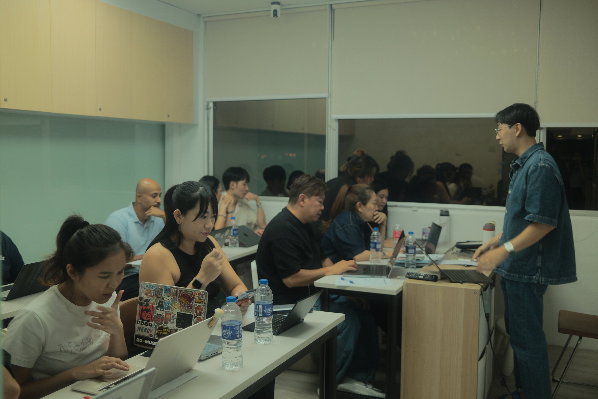 Participants building their first AI agent at Workshop #02